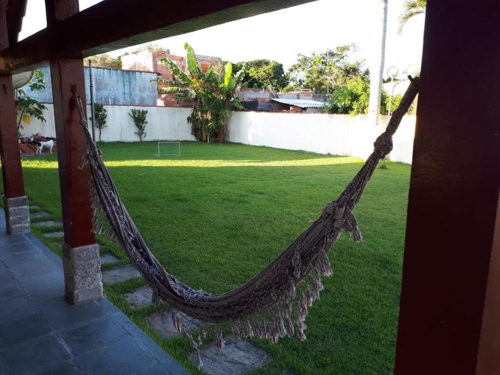 Varanda com rede e gramado